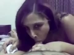 Brunette Indian lady with large boobies was engulfing her man's knob